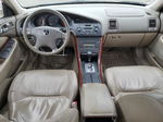 2002 Acura 3.2tl  Желто-коричневый vin: 19UUA56672A061609