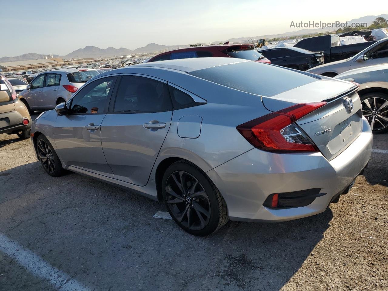 2019 Honda Civic Sport Серебряный vin: 19XFC2F89KE025693