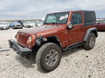 2014 Jeep Wrangler Rubicon Orange vin: 1C4BJWCG8EL265479