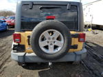 2014 Jeep Wrangler Unlimited Sport Tan vin: 1C4BJWDG2EL242326