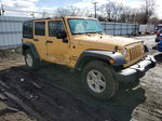 2014 Jeep Wrangler Unlimited Sport Tan vin: 1C4BJWDG2EL242326