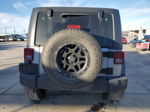 2014 Jeep Wrangler Unlimited Sport Silver vin: 1C4BJWDG3EL180029