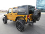 2014 Jeep Wrangler Unlimited Sport Yellow vin: 1C4BJWDG5EL168559