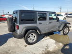 2014 Jeep Wrangler Unlimited Sport Silver vin: 1C4BJWDG7EL127530