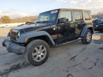 2014 Jeep Wrangler Unlimited Sport Black vin: 1C4BJWDG8EL223148