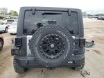 2014 Jeep Wrangler Unlimited Sport Silver vin: 1C4BJWDGXEL129949