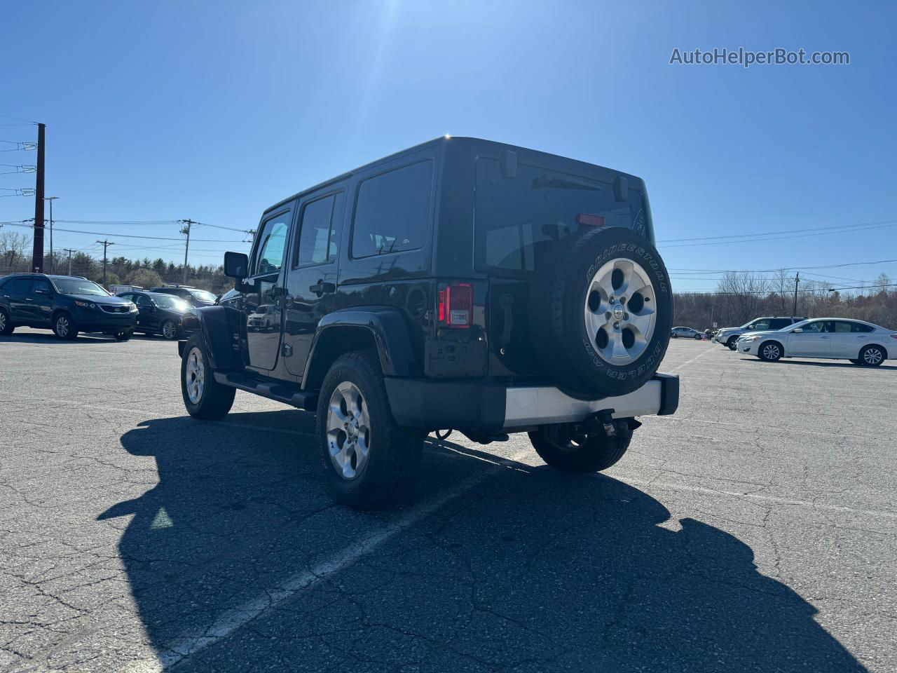 2014 Jeep Wrangler Unlimited Sahara Black vin: 1C4BJWEG2EL210636