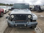 2014 Jeep Wrangler Unlimited Sahara Silver vin: 1C4BJWEG9EL184620