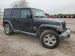 2014 Jeep Wrangler Unlimited Sahara Черный vin: 1C4BJWEGXEL121865