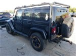 2014 Jeep Wrangler Unlimited Sahara Black vin: 1C4BJWEGXEL150170