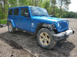 2014 Jeep Wrangler Unlimited Sahara Blue vin: 1C4BJWEGXEL247840