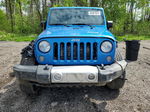 2014 Jeep Wrangler Unlimited Sahara Blue vin: 1C4BJWEGXEL247840