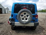 2014 Jeep Wrangler Unlimited Sahara Blue vin: 1C4BJWEGXEL247840