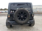 2014 Jeep Wrangler Unlimited Rubicon Black vin: 1C4BJWFG7EL321648