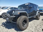 2014 Jeep Wrangler Unlimited Rubicon Black vin: 1C4BJWFG9EL306018