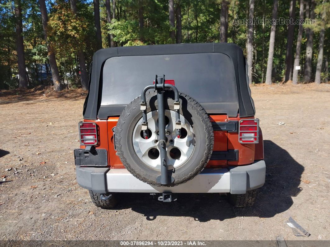 2014 Jeep Wrangler Sahara Orange vin: 1C4GJWBG8EL299218