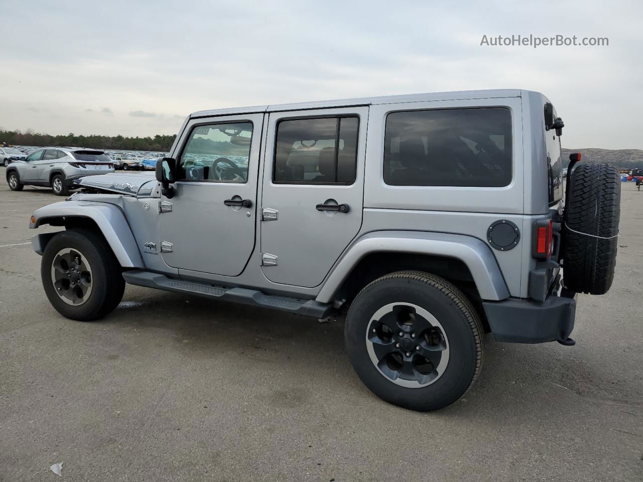 2014 Jeep Wrangler Unlimited Sahara Silver vin: 1C4HJWEG7EL202879