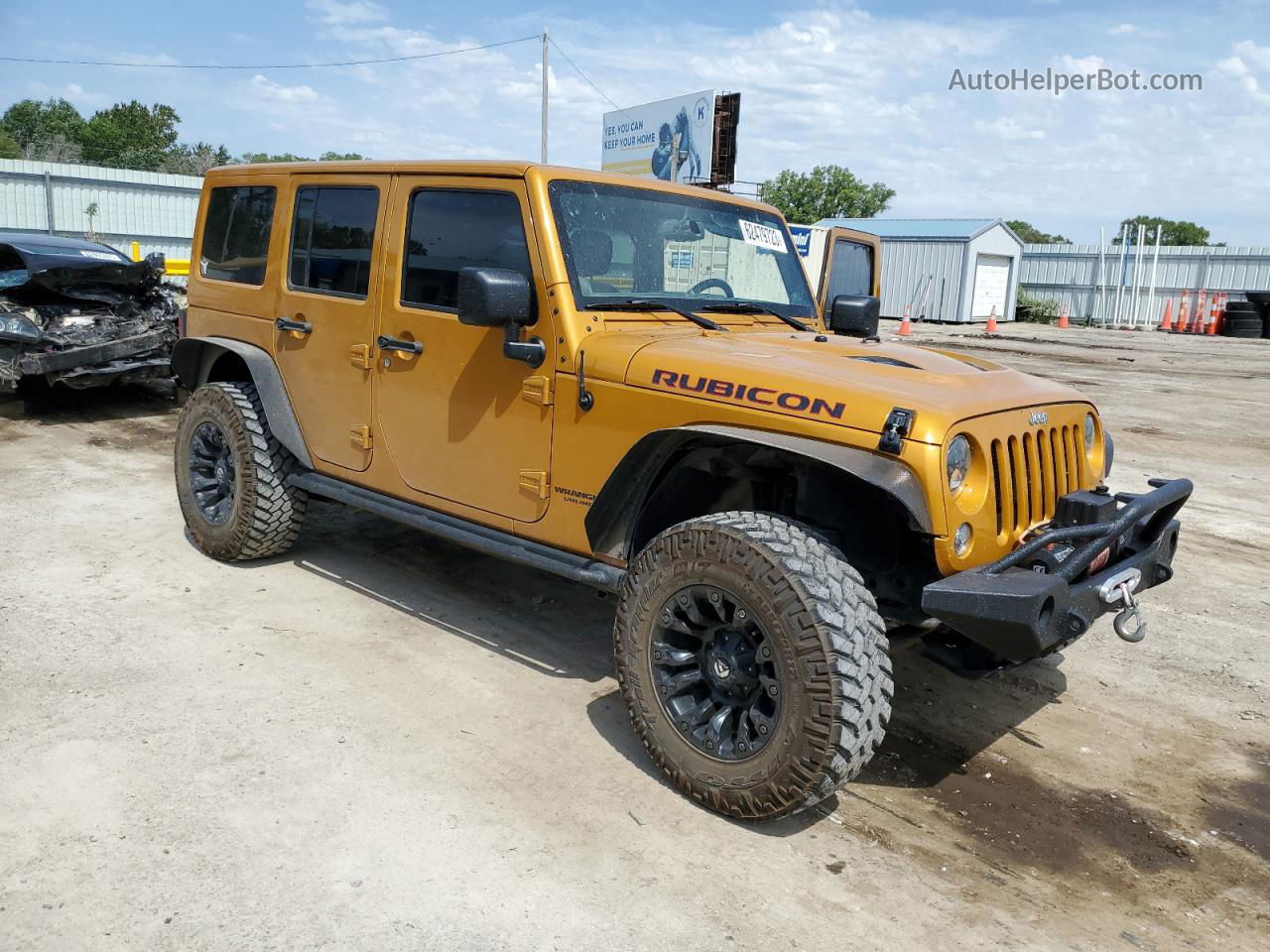 2014 Jeep Wrangler Unlimited Rubicon Gold vin: 1C4HJWFG4EL217774