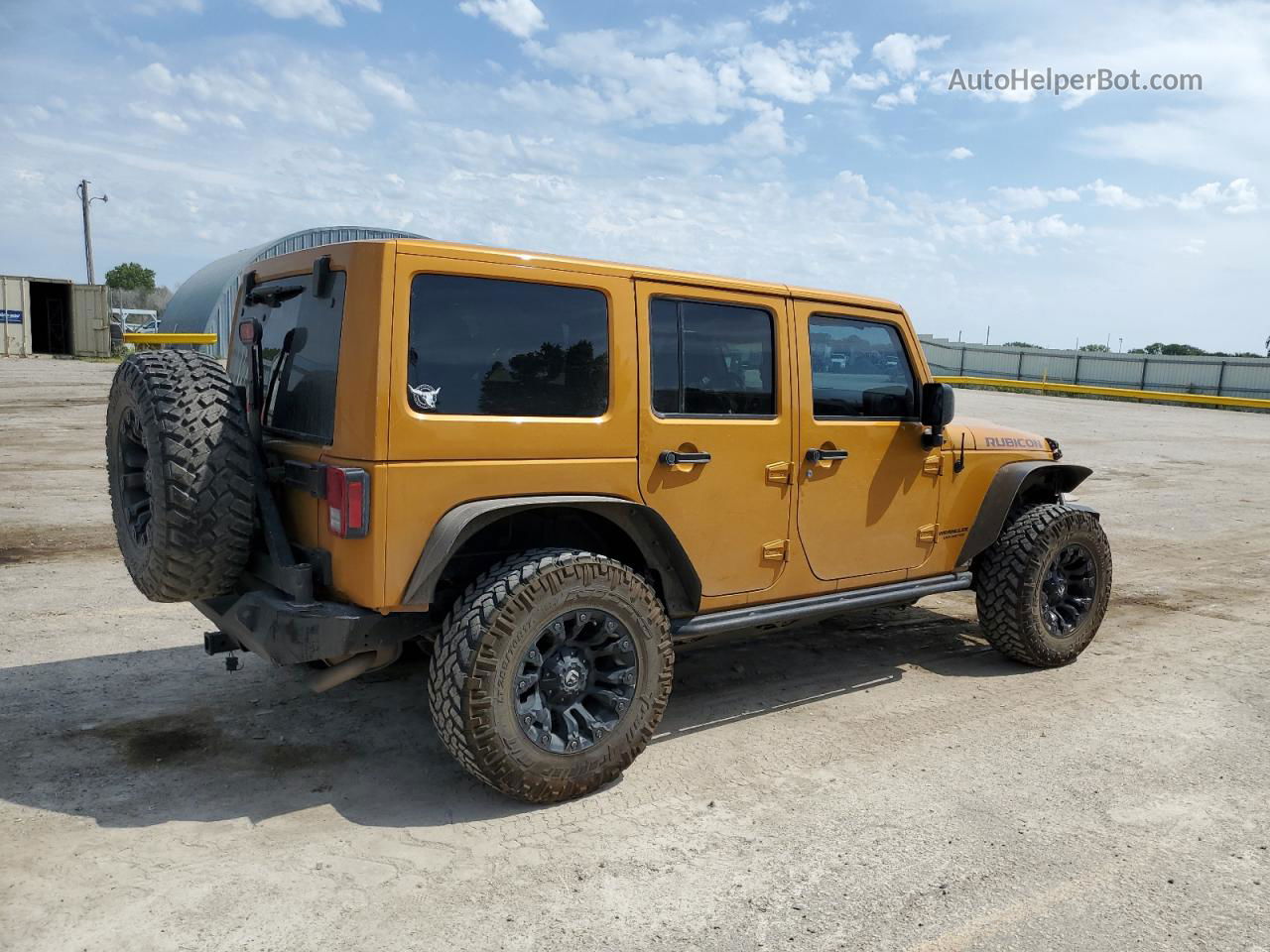 2014 Jeep Wrangler Unlimited Rubicon Gold vin: 1C4HJWFG4EL217774