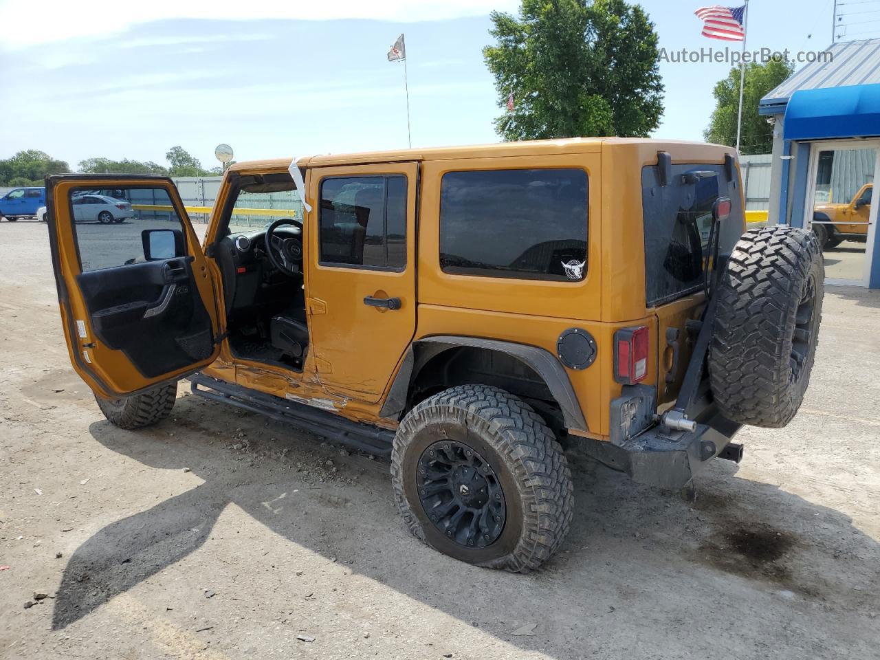 2014 Jeep Wrangler Unlimited Rubicon Gold vin: 1C4HJWFG4EL217774