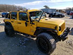 2019 Jeep Wrangler Unlimited Sahara Yellow vin: 1C4HJXEG9KW518204