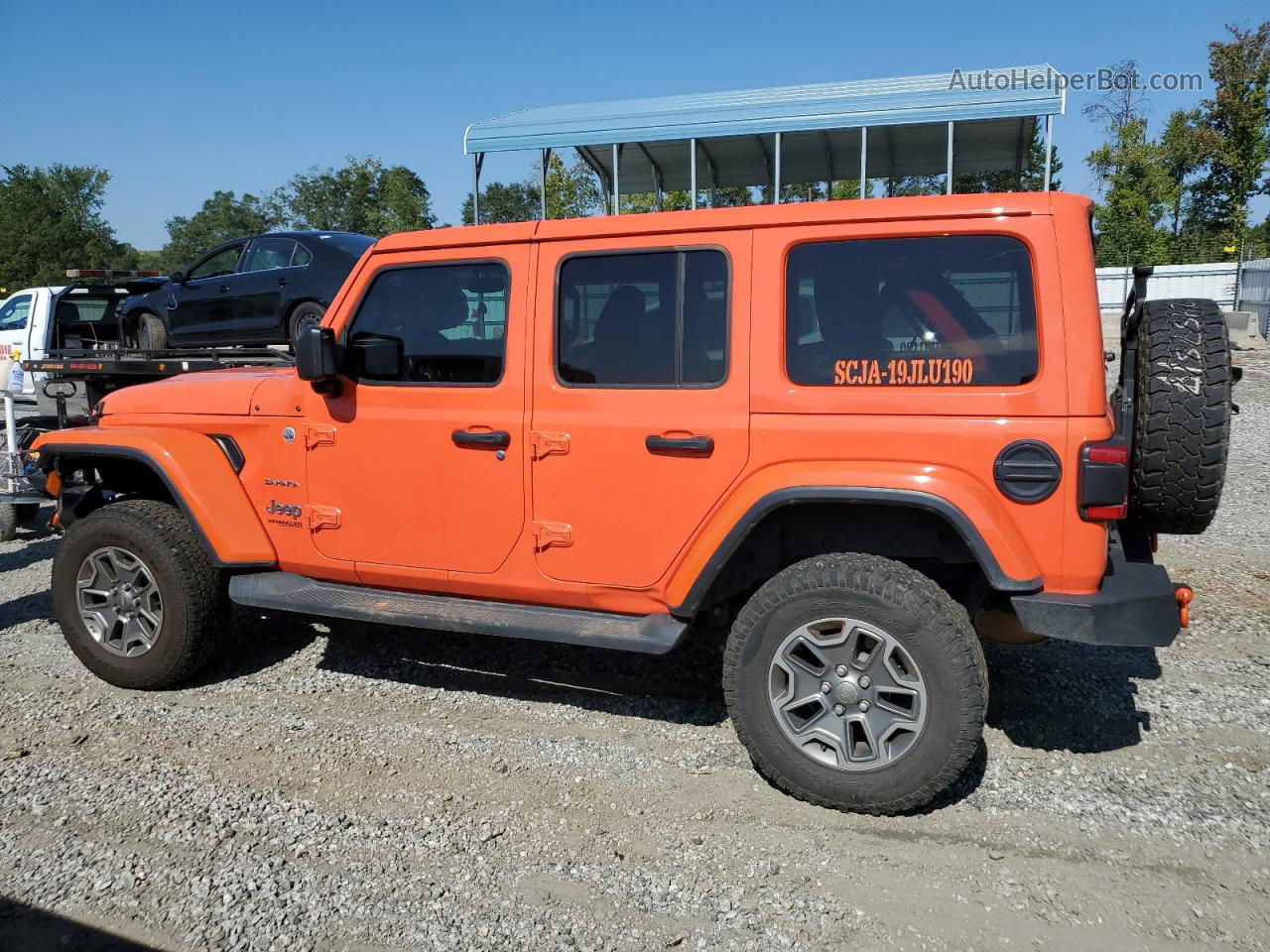 2019 Jeep Wrangler Unlimited Sahara Orange vin: 1C4HJXEN6KW524220