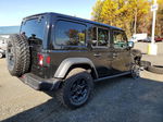 2023 Jeep Wrangler 4xe Black vin: 1C4JJXN62PW613042