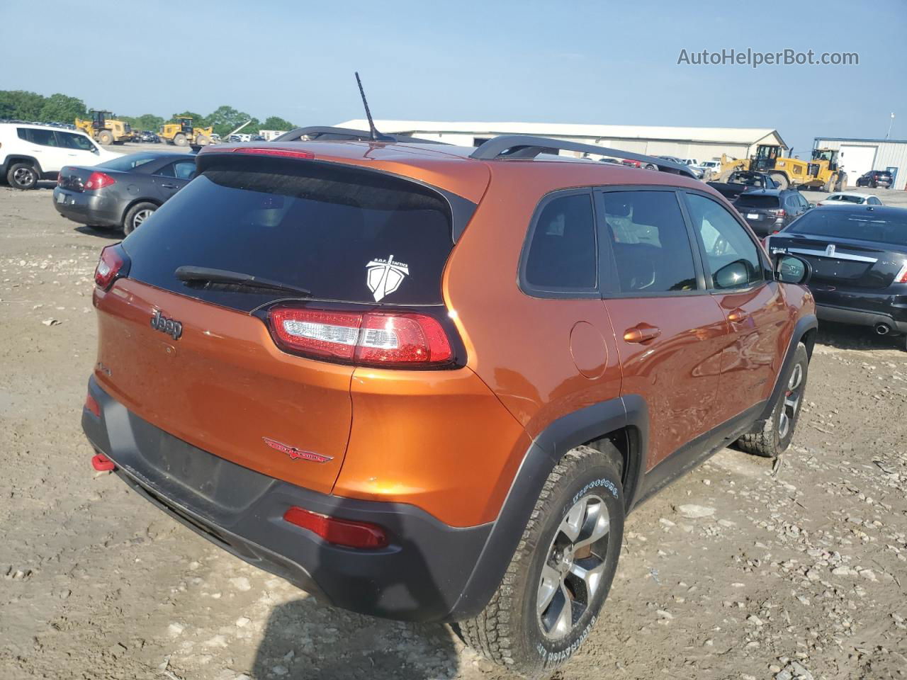 2015 Jeep Cherokee Trailhawk Orange vin: 1C4PJMBS0FW693577