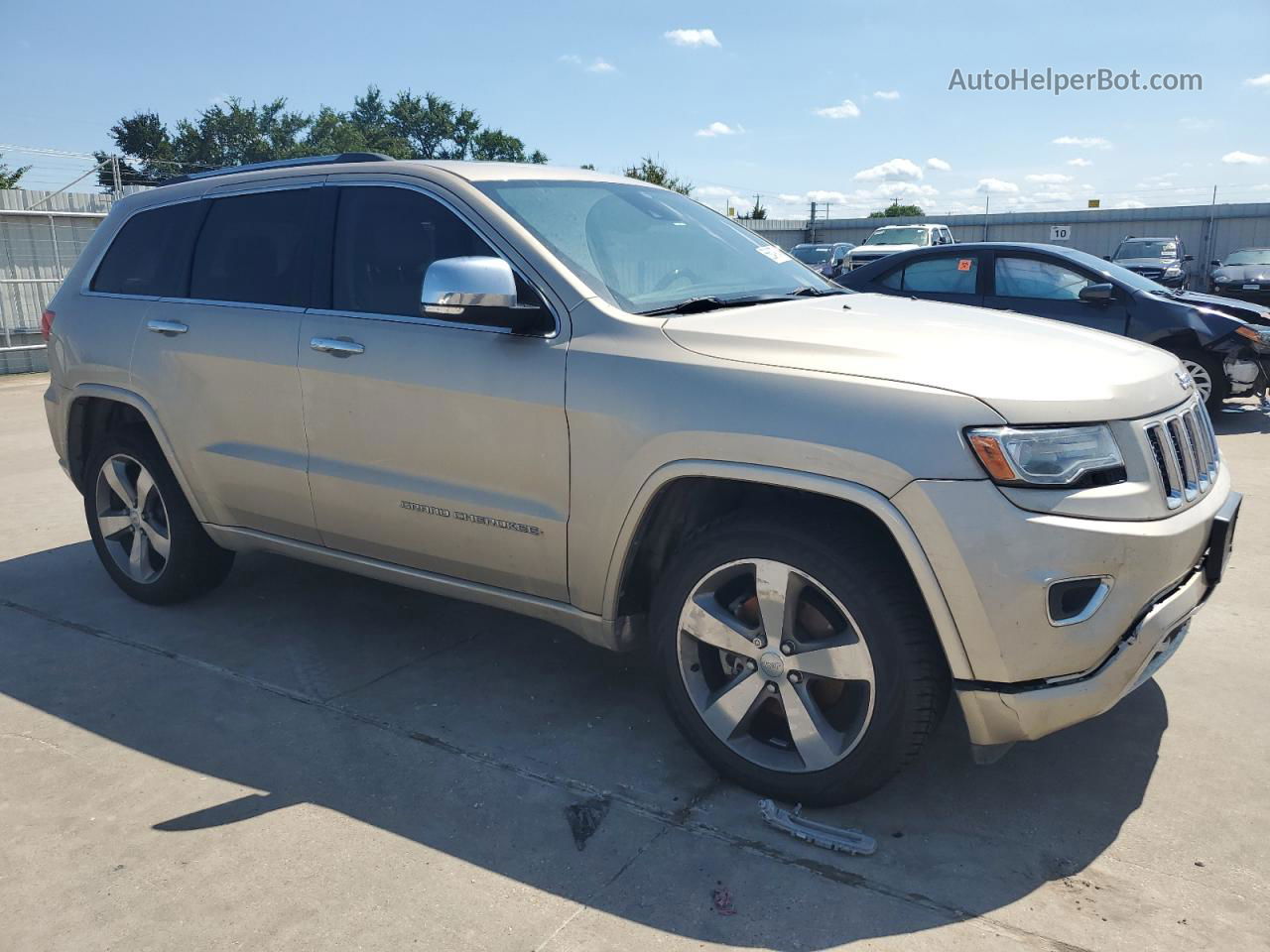 2014 Jeep Grand Cherokee Overland Tan vin: 1C4RJECM9EC300268