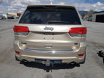 2014 Jeep Grand Cherokee Overland Золотой vin: 1C4RJFCM1EC298828