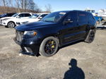 2021 Jeep Grand Cherokee Trackhawk Черный vin: 1C4RJFN90MC817388