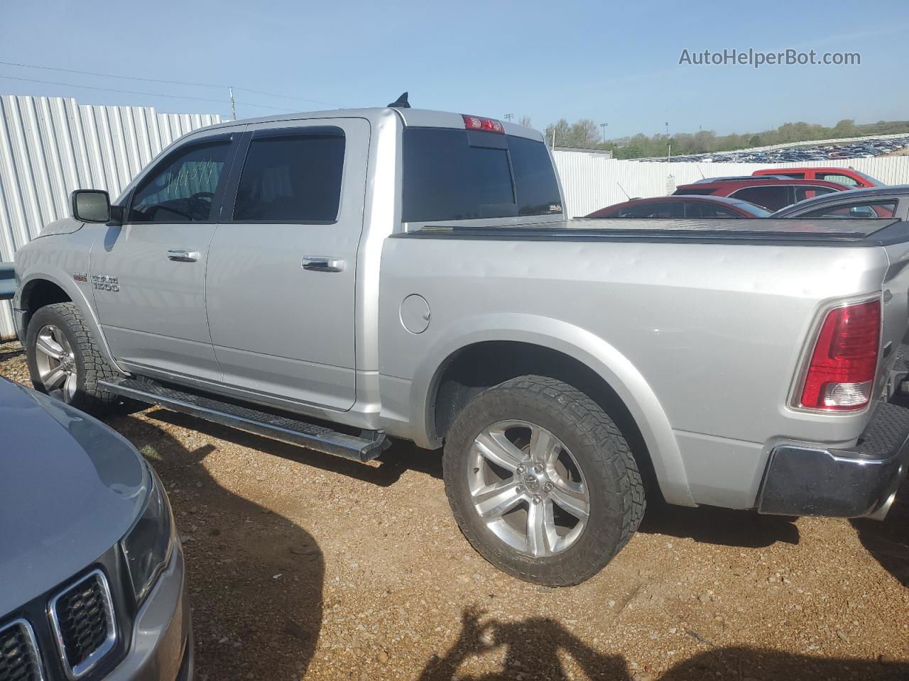 2014 Ram 1500 Laramie Silver vin: 1C6RR7NT2ES188421