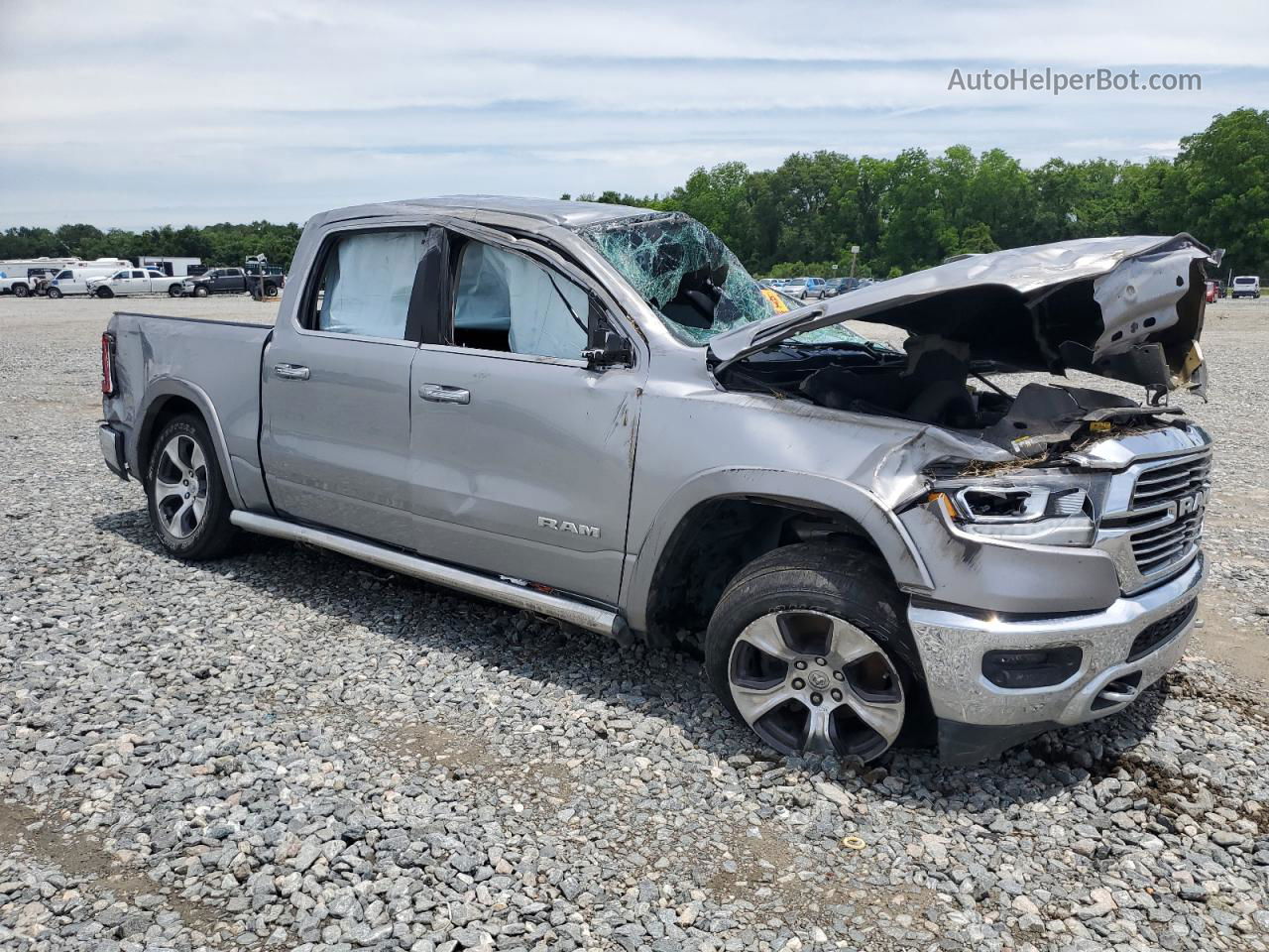 2019 Ram 1500 Laramie Silver vin: 1C6SRFJT7KN810250