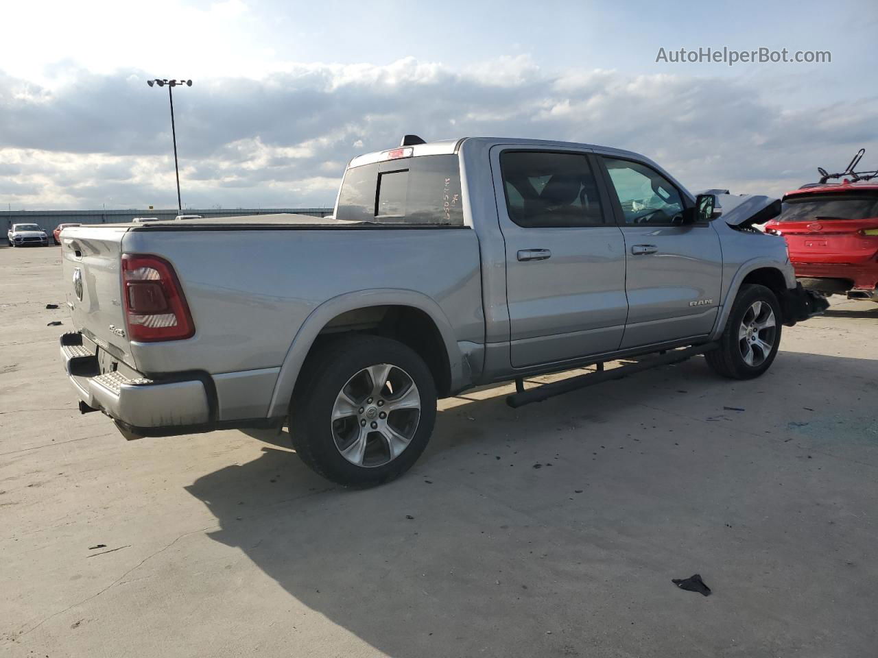 2019 Ram 1500 Laramie Silver vin: 1C6SRFJT9KN589721