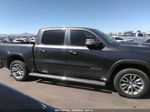 2019 Ram 1500 Laramie  4x4 5'7" Box Gray vin: 1C6SRFJTXKN574936