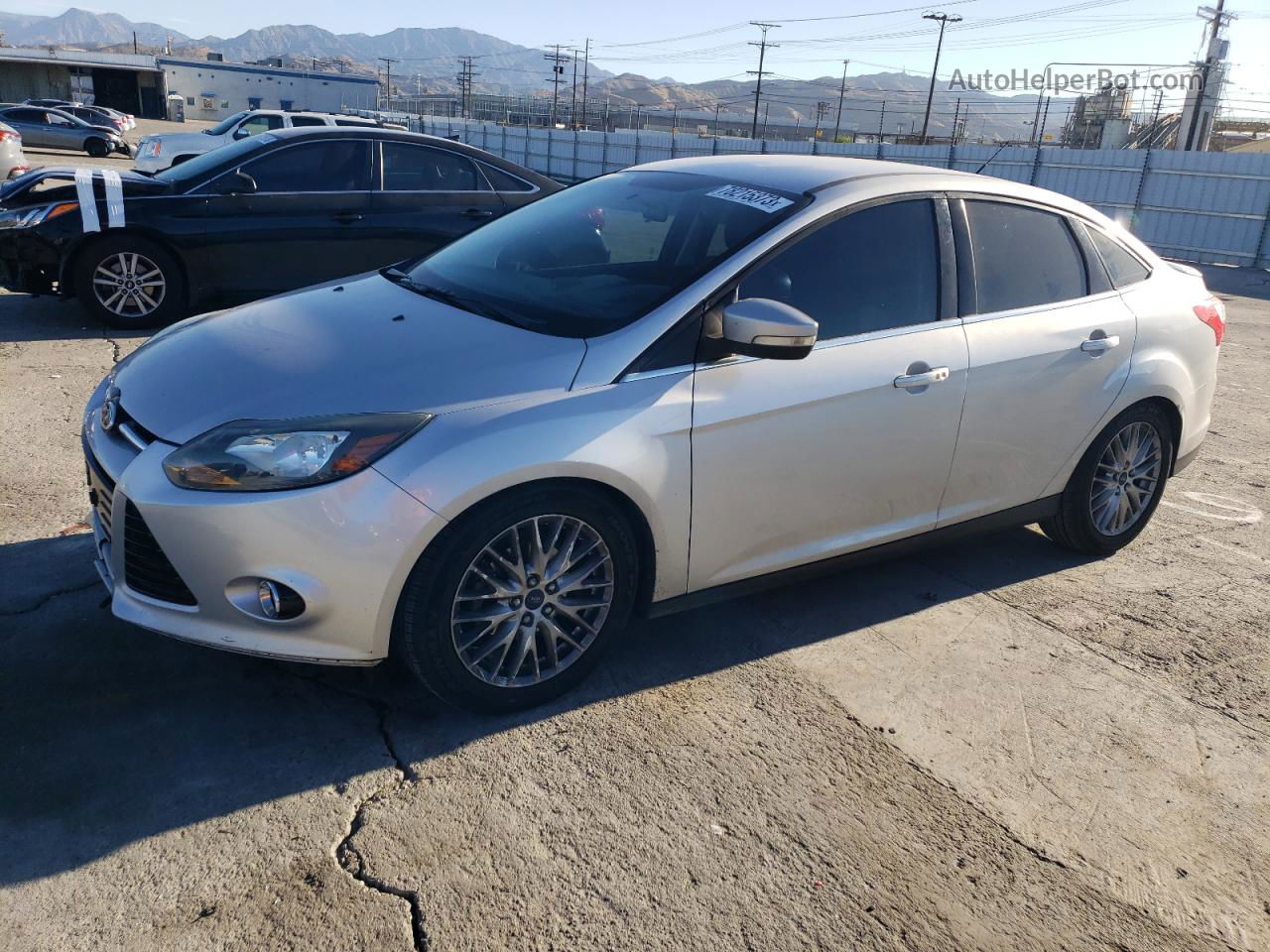 2014 Ford Focus Titanium Серебряный vin: 1FADP3J20EL198959