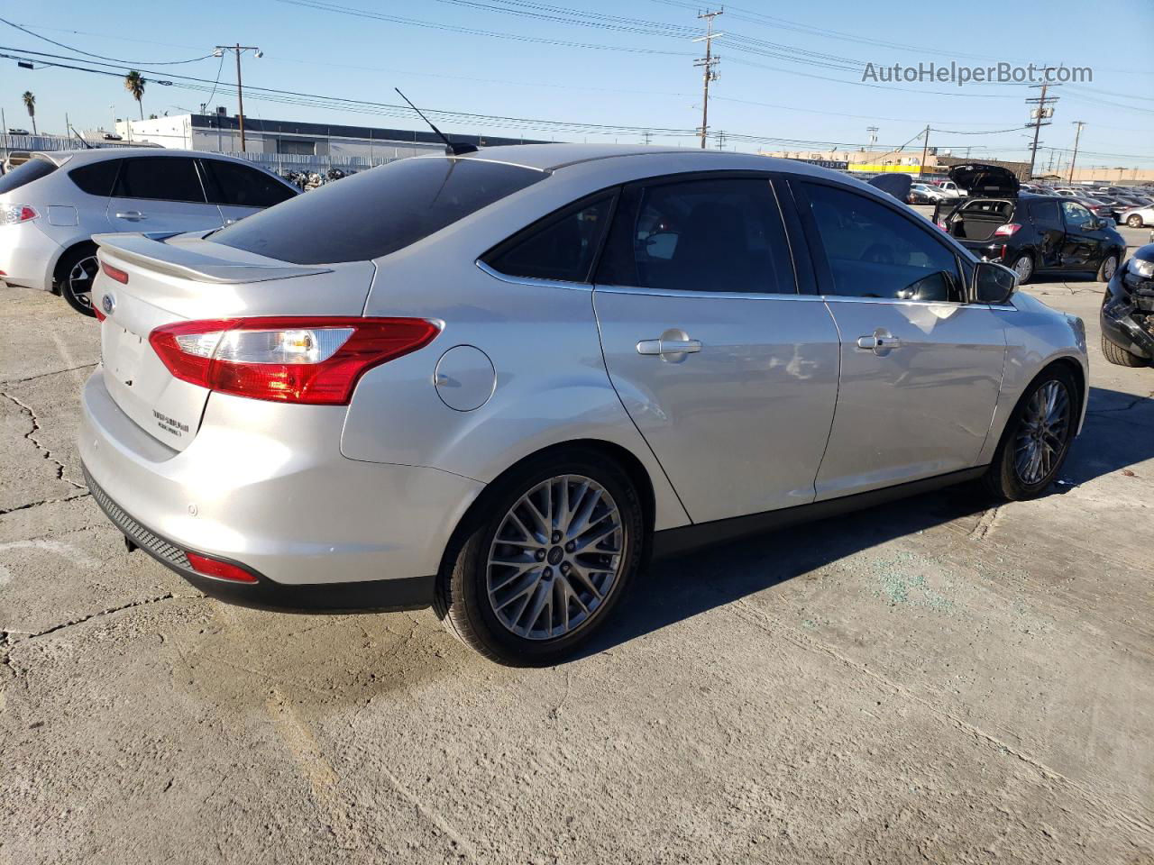 2014 Ford Focus Titanium Серебряный vin: 1FADP3J20EL198959