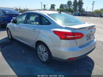 2015 Ford Focus Titanium Серебряный vin: 1FADP3J22FL337913