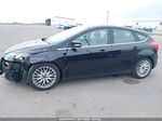 2014 Ford Focus Titanium Black vin: 1FADP3N24EL224408