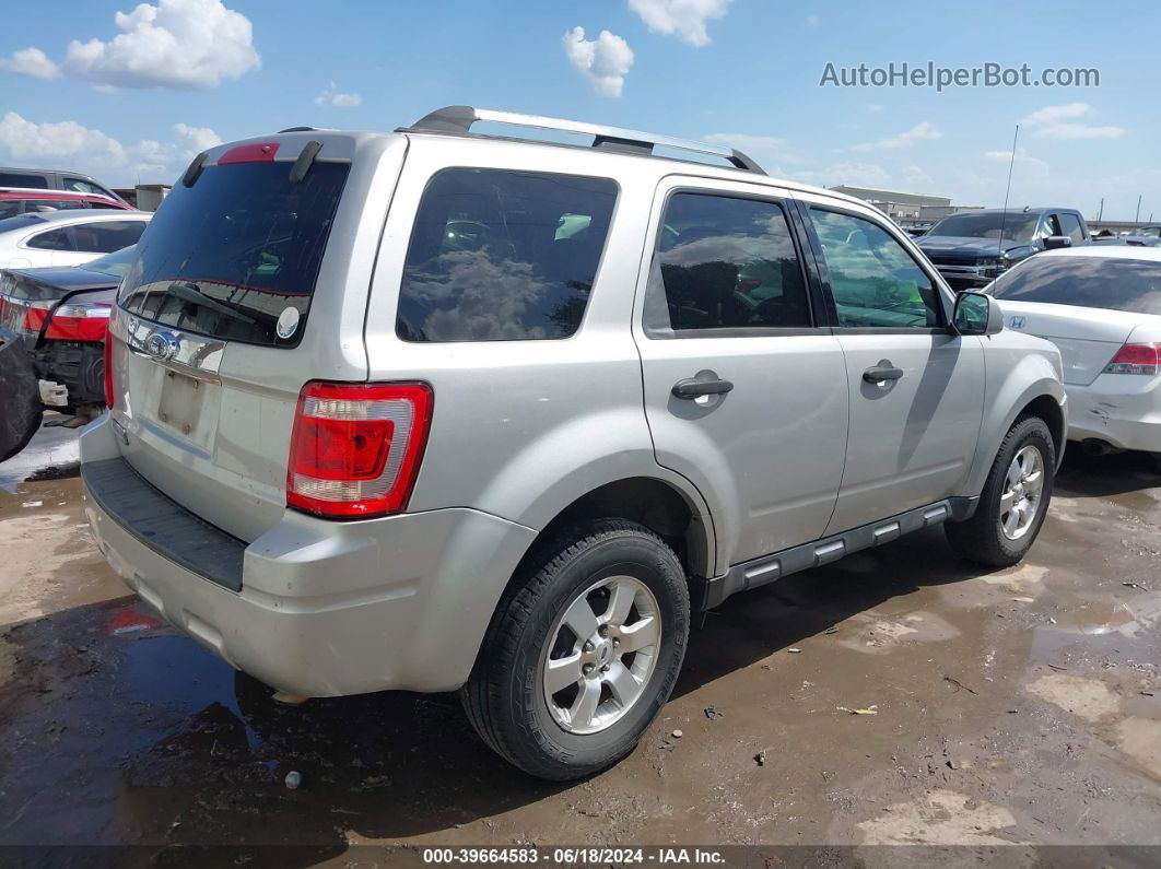 2009 Ford Escape Limited Серебряный vin: 1FMCU04G79KA18906