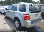 2009 Ford Escape Limited Серебряный vin: 1FMCU04G79KA18906