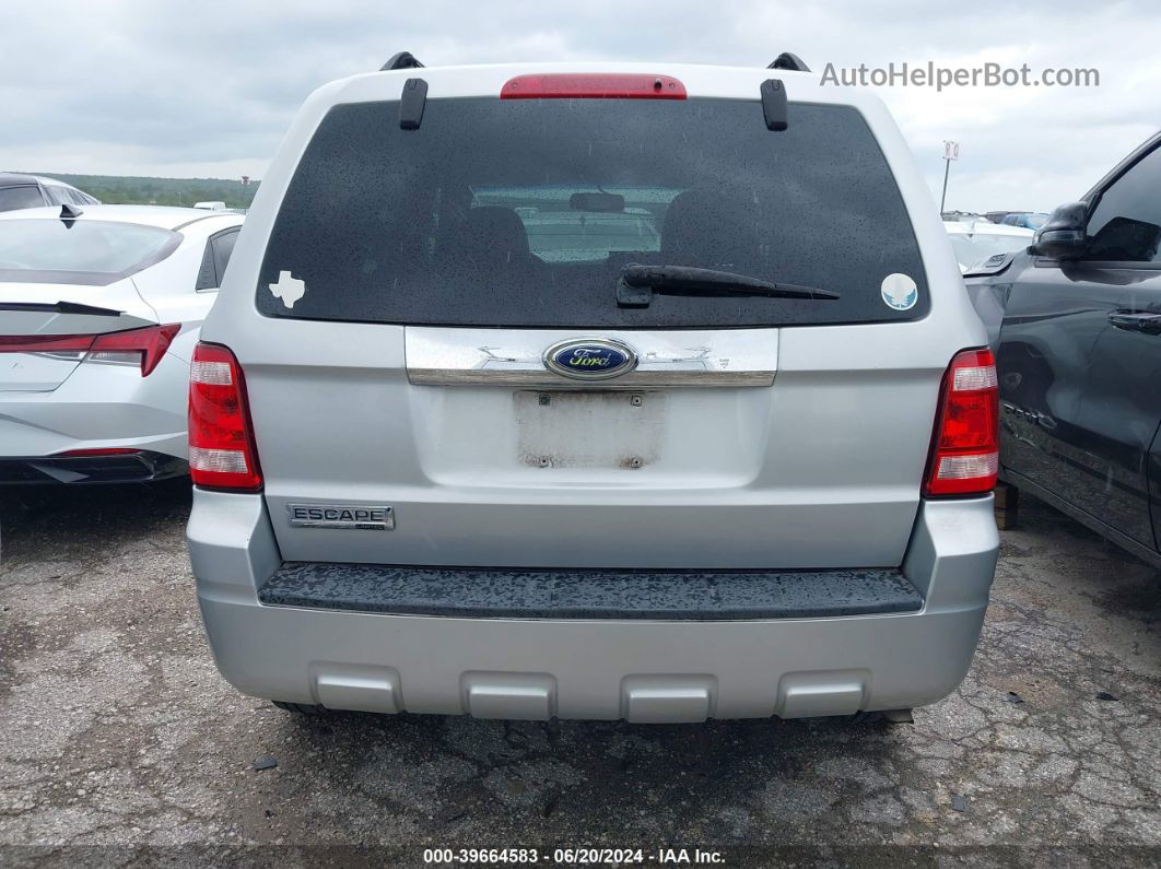 2009 Ford Escape Limited Серебряный vin: 1FMCU04G79KA18906