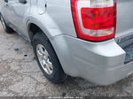 2009 Ford Escape Limited Серебряный vin: 1FMCU04G79KA18906