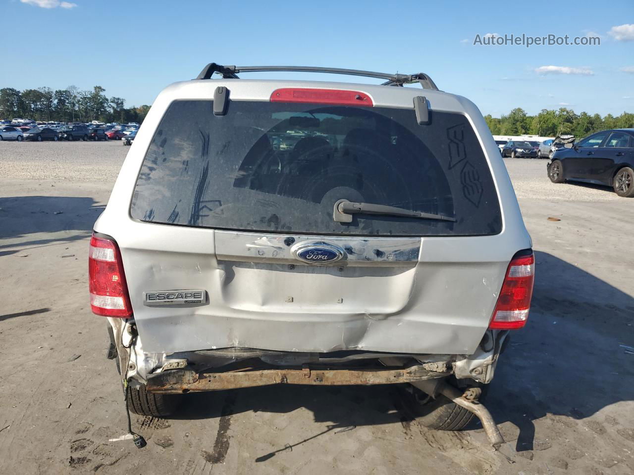 2009 Ford Escape Limited Серебряный vin: 1FMCU04G79KA63585