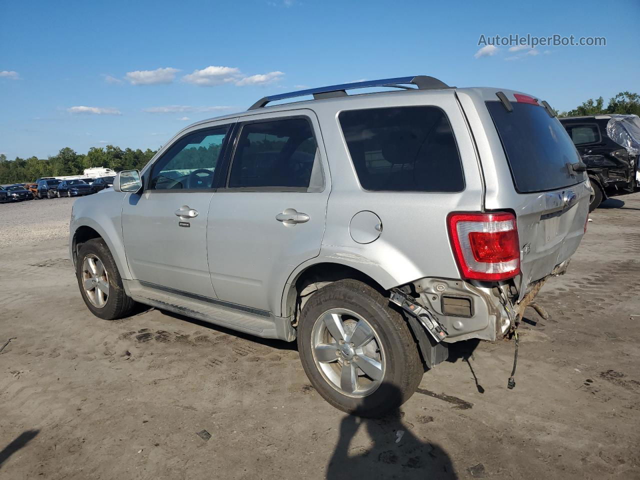 2009 Ford Escape Limited Серебряный vin: 1FMCU04G79KA63585