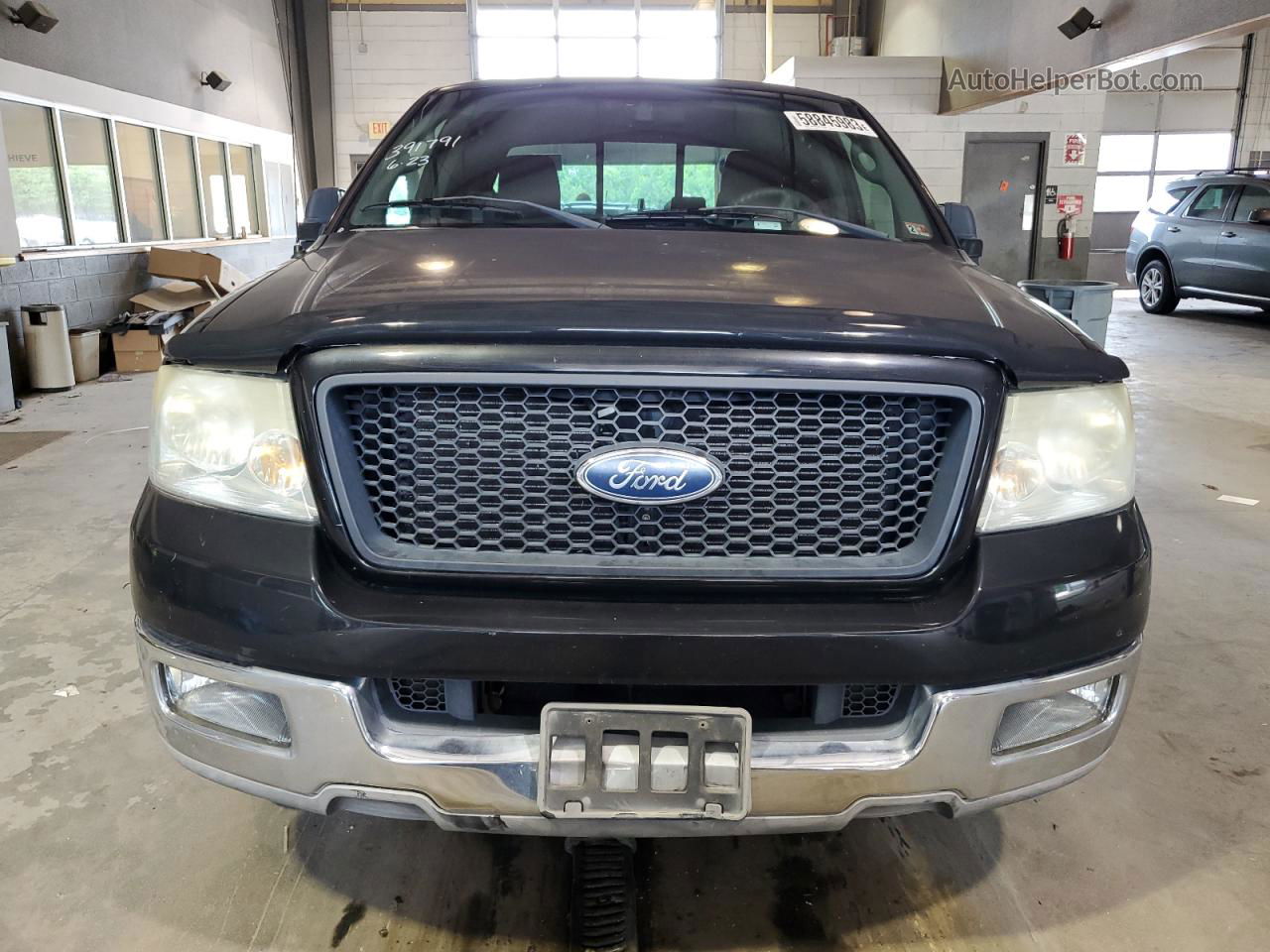 2004 Ford F150  Black vin: 1FTPX12534NC50043