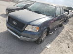 2004 Ford F150  Blue vin: 1FTPX12594NC73374