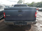 2004 Ford F150  Blue vin: 1FTPX14544NB28983