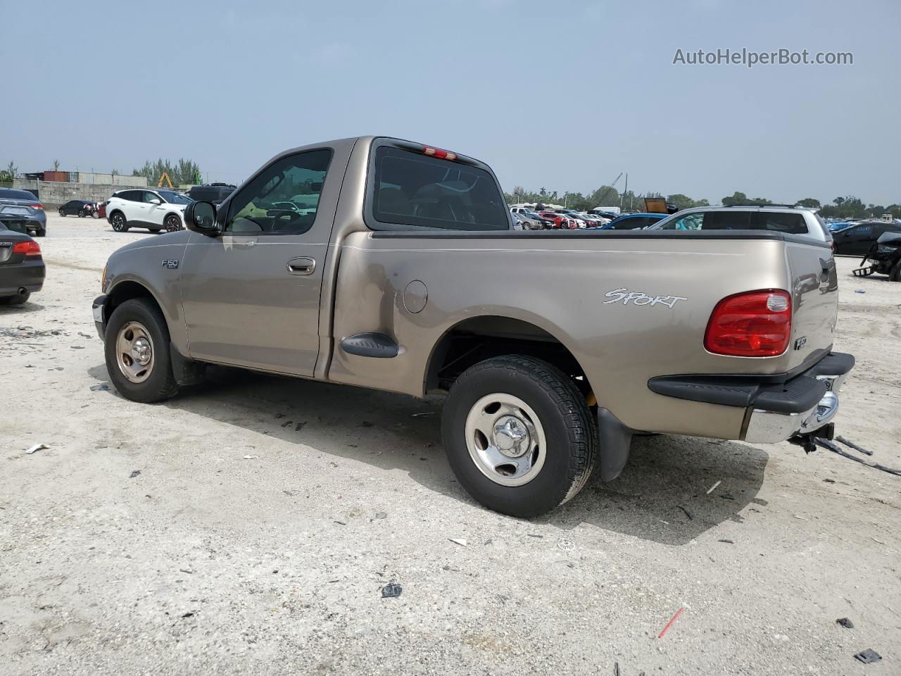 2003 Ford F150  Желто-коричневый vin: 1FTRF072X3KC77292