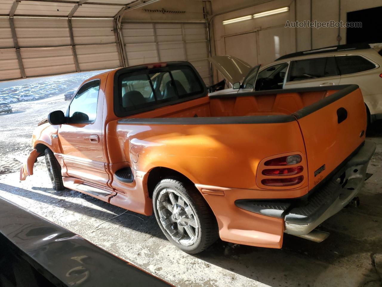 2003 Ford F150  Orange vin: 1FTRF07L83KA93302